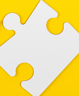 Single puzzle piece on yellow background